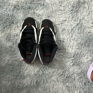 air jordan 14s black white with a little red. size 6Y